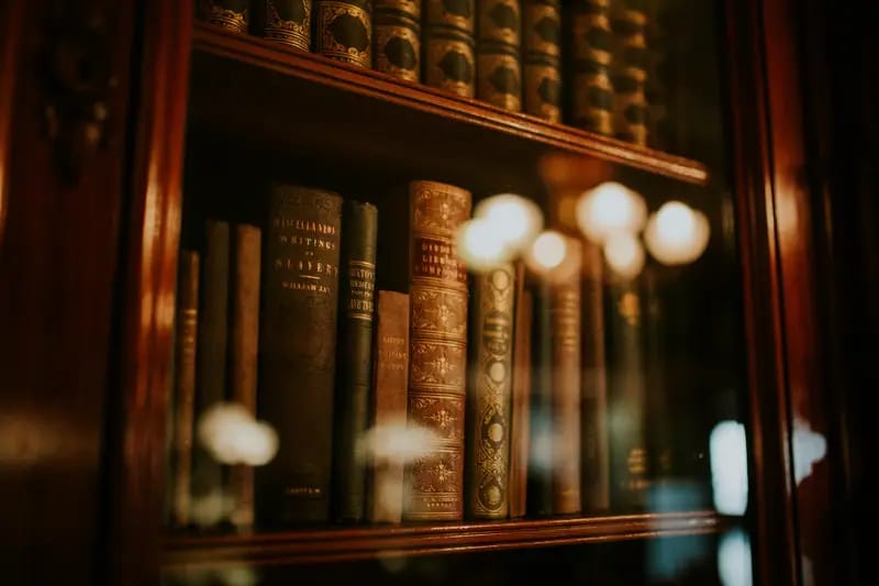 Antique law reports and legal statute books in a chamber bookcase